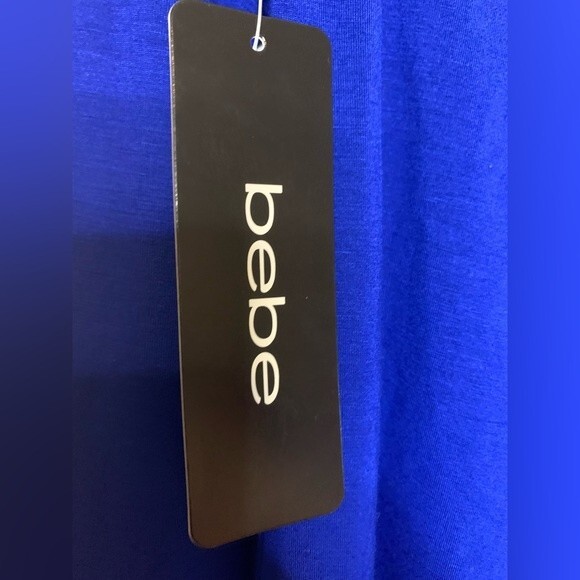 NWT BEBE LONG SLEEVE SOFT TOP WITH RHINESTONE LOGO EMBELLISHMENT. Size Small - Picture 4 of 6